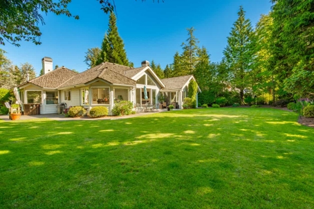 a house with a wide lawn